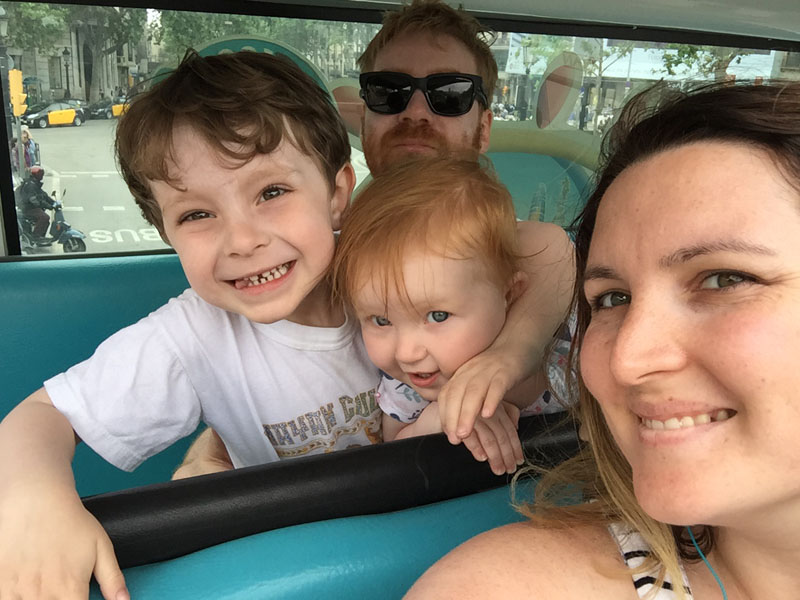 Flashpacker Family on a Hop On, Hop Off Bus in Barcelona, Spain