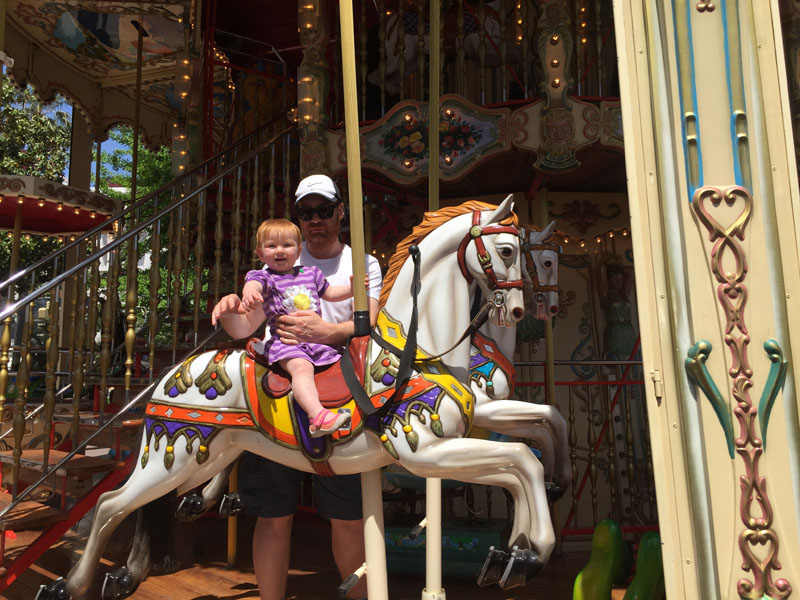 Hazel Riding a Carousel in Nice, France