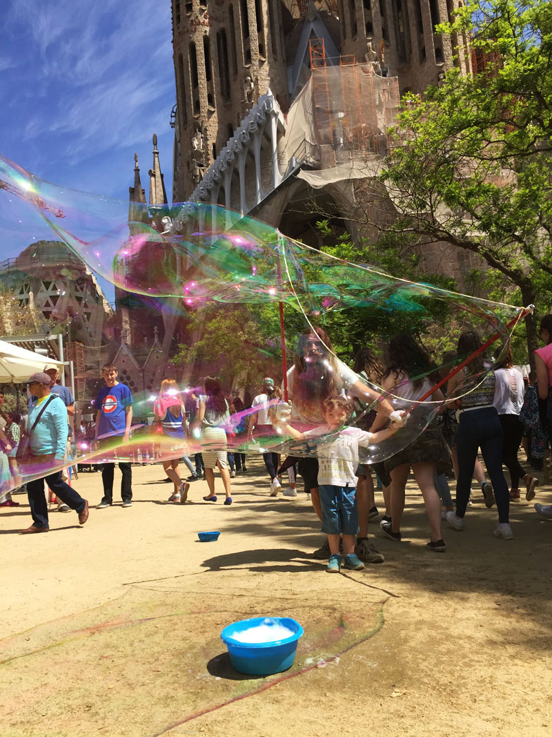 Reuben Making Bubbles in front of Sagrada Familia, Spain